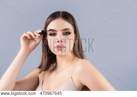 Woman Shaping Brown Eyebrows. Woman Eye With Beautiful Eyebrows. Shaped Brows, Long Eyelashes. Paint