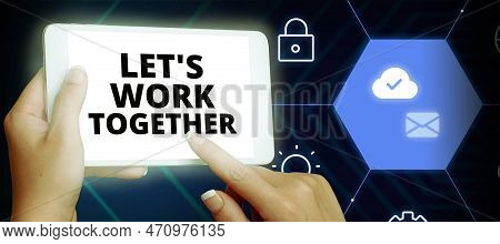 Hand Writing Sign Lets Work Together. Business Approach Unite And Join Forces To Achieve A Common Go