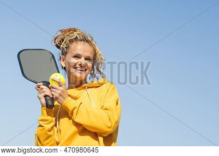 Portrait Woman Player Pickleball Game, Hitting Pickleball Yellow Ball With Paddle, Outdoor Sport Lei