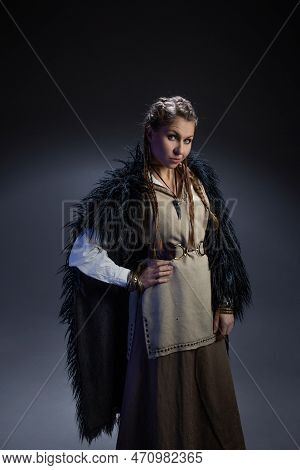 An Authoritative, Self-confident Woman In A Viking-style Fantasy Costume. Skirt With Shirt And Long 