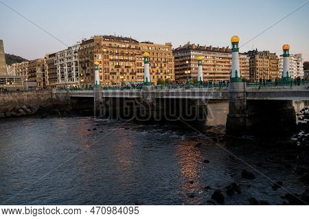 Evening Walk Along River In Central Part Of Donostia Or San Sebastian City, Basque Country, Spain