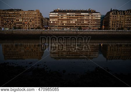 Evening Walk Along River In Central Part Of Donostia Or San Sebastian City, Basque Country, Spain