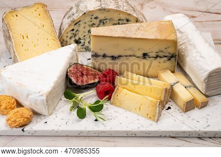 Cheese Collection, Marble Board With French Cheeses Brie, Tomme, Matured Goat Cheese, Morbier  Serve