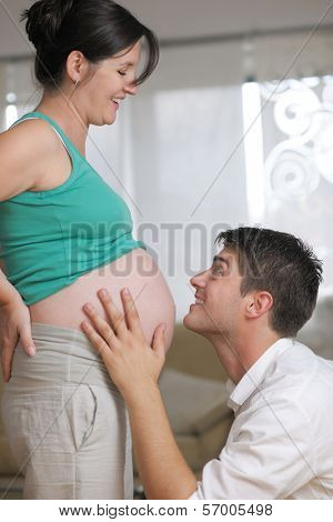 happy young cuple, pregnant woman