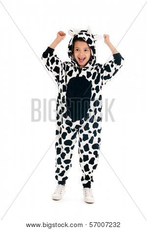 Little boy dressed as cow isolated over white background