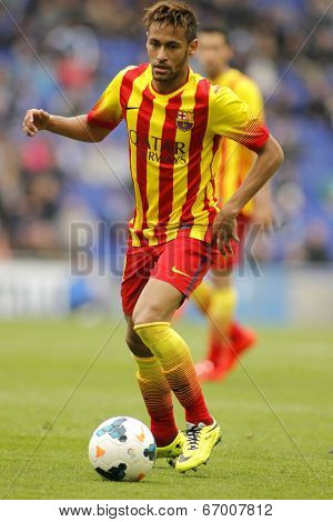 BARCELONA - MARCH, 29: Neymar da Silva of FC Barcelona in action during a Spanish League match against RCD Espanyol at the Estadi Cornella on March 29, 2014 in Barcelona, Spain