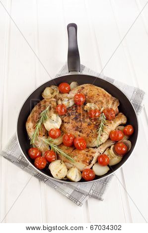Chicken Drumsticks With Onions And Cherry Tomatoes