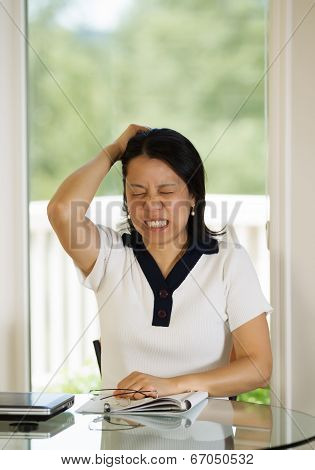 Mature Woman Expressing Extreme Stress