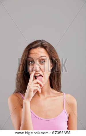 Girl With A Finger In Her Nose