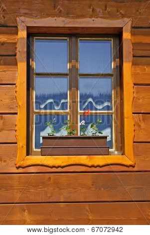 Window of wooden cottage