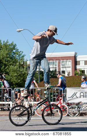 Man Practices Flatland Bike Tricks Before Bmx Competition