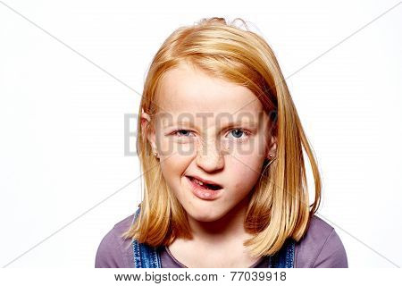 young girl with red hair make grimaces