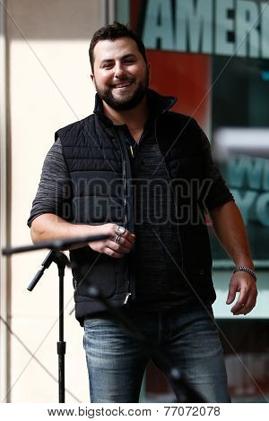 NEW YORK-AUG 22: Country music singer Tyler Farr performs at Fox and Friends' All-American Summer Concert Series on the corner of 48th Street and 6th Avenue on August 22, 2014 in New York City.