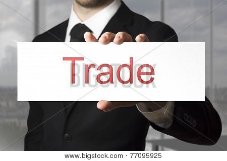 Businessman Holding Sign Trade