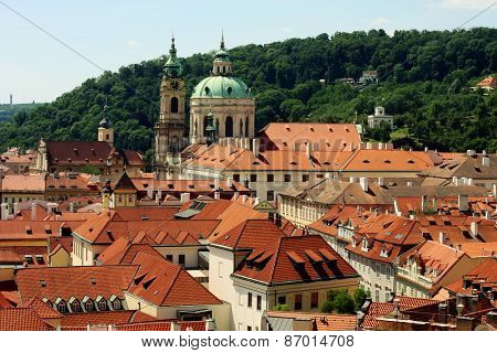 Houses with traditional red roofs in Prague Old Town Square in the Czech Republic 