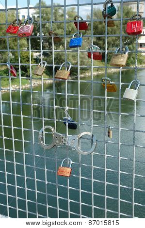 Padlocks Left By Lovers On Bridge In Ingolstadt, Germany.