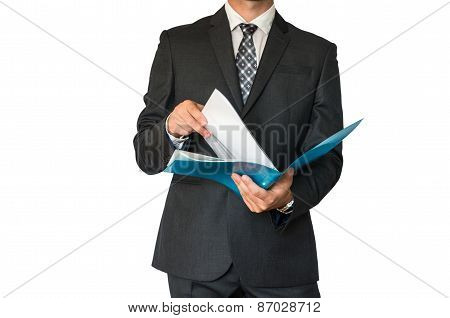 Man In Suit Looking At Documents