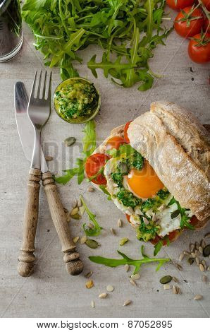 Ciabatta With Fried Egg, Tomatoes And Pesto