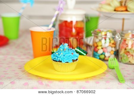 Prepared birthday table with sweets for children party