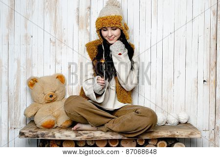 Cheerful funny woman in warm hat