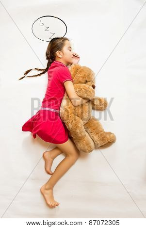 View From Top View Of Dreaming Girl Lying On Big Teddy Bear
