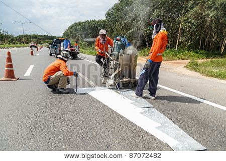 Suratthani, Thailand - January 9 : Team Of Civil Worker Work On Highway, They Draw White Line On Roa