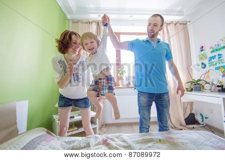 Young Attractive Parents and Child Portrait indoors
