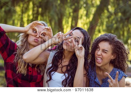Happy hipsters in the park on a sunny day