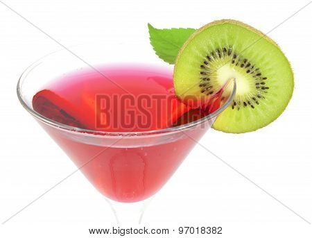 Kiwi slice on wineglass side. Tropical alcoholic cocktail.