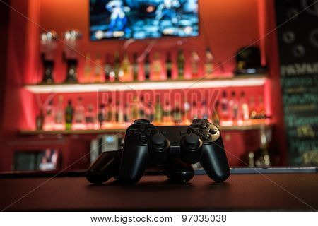 Video games at bar counter