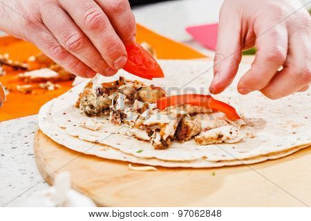 chef making tortilla