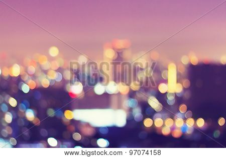 Vintage style of blur city lights background. Bokeh background.