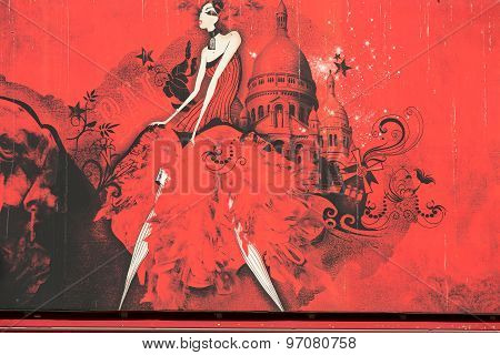 PARIS, FRANCE - SEPTEMBER 10, 2014: The Moulin Rouge in Paris France. Moulin Rouge is the most famous Parisian cabaret and it created the modern can-can dance.