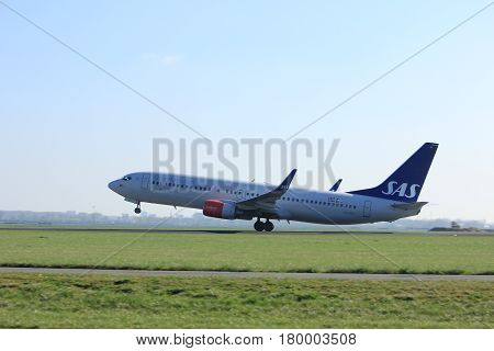 Amsterdam the Netherlands - April 2nd 2017: LN-RRJ SAS Scandinavian Airlines Boeing 737 takeoff from Polderbaan runway Amsterdam Airport Schiphol
