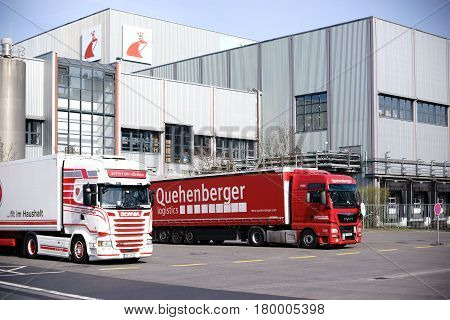 MAINZ, GERMANY - MARCH 24: Trucks parked in front of the entrance to the headquarter of the shoe care products producer Erdal of the company Werner and Mertz on March 24, 2017 in Mainz.