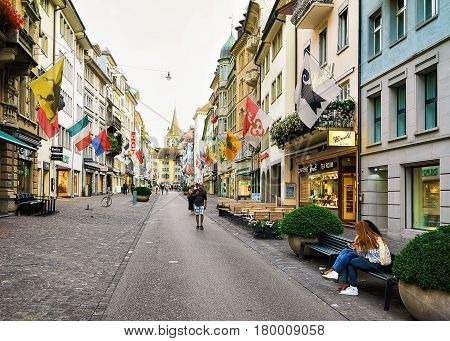 People At Rennweg Pedestrian Street And St Peter Church Zurich