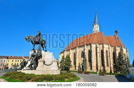 Cluj Napoca city Romania Statue of Matei Corvin and Saint Michael's Church