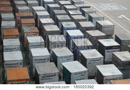 DELHI, INDIA - FEBRUARY 19: Top view of containers cargo truck on the ground in the Delhi airport on February 19, 2016. Indira Gandhi International Airport is the 32th busiest in the world.