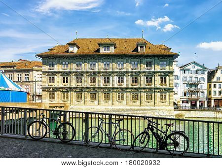 Bicycles At Old Town Hall In River Limmat In Zurich