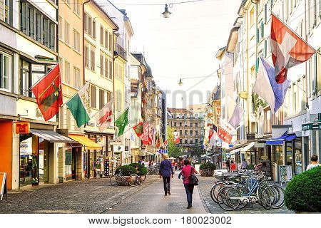 People At Rennweg Pedestrian Street With Flags Zurich