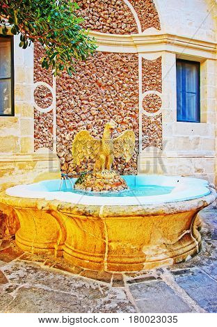 Raptor Bird Fountain At Courtyard Garden Of Grandmaster Palace Valletta