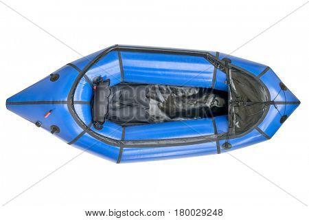 a blue packraft (one-person light raft used for expedition or adventure racing) isolated on white with a clipping path, top view