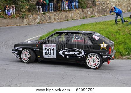 Testico Italy - April 01 2017-64 Di Sanremo Rally: The Lancia Delta Integrale conducted by the crew Lucky-Pons during the second special stage of speed 'timed race, one that led to the summit from Testico' del Colle D'Oggia.