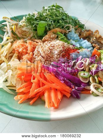 Close up picture of ingredient for Thai Southern Spicy Rice Salad or Khao Yam.