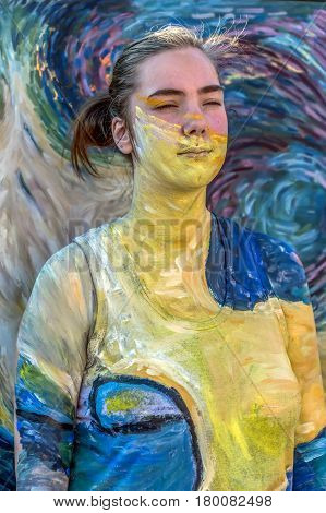 TIMISOARA ROMANIA - MARCH 31 2017: Face and body painting of a woman. 3D art symbolizing on live at the street inside the CheckART Carnival organized by the City Hall Timisoara. Liberty Square.