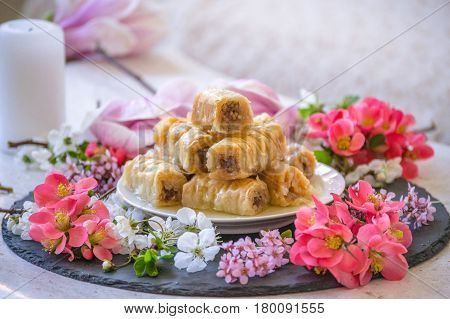 Turkish Rolled Baklava and Colorful Spring Flowers