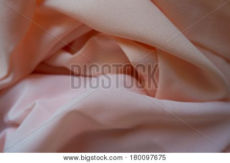 Chiffon fabric in pink and peach pastel colors (horizontal)