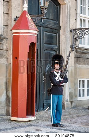 COPENHAGEN DENMARK - MARCH 11 2017: Amalienborg Palace Copenhagen. Royal Life Guards (Danish: Den Kongelige Livgarde) infantry regiment of Denmark Army founded in 1658 by King Frederik III