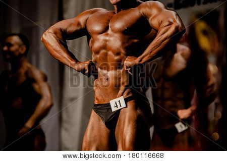 athlete bodybuilder posing most muscular bodybuilding competitions