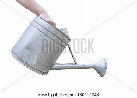 Hand holding watering can isolated on white background - clipping path inside